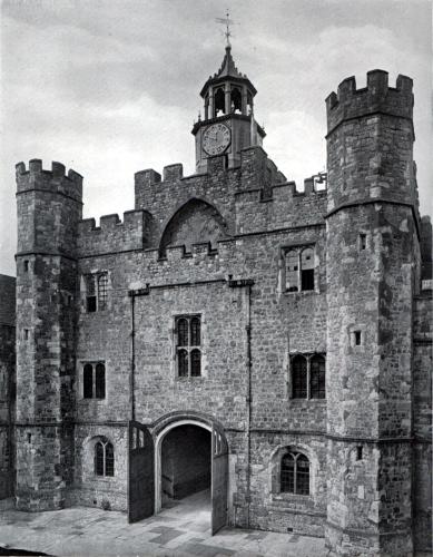 A three story castle-looking home. It is made of stone.